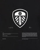 ART OF x Leeds Exhibition Tee | LUFC Black Graphic Football T-shirt